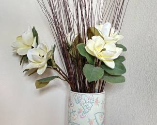 Large Chinoiserie vase decorated in a pastel floral design. Made in China. Vase measures H 18" x 9" diameter. Includes faux floral.