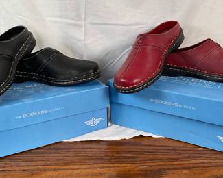 Two new pairs of Dockers Women's "Daffodil" slip on leather shoes, size 8. One pair red and one pair black. Includes original boxes.