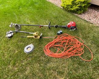 Craftsman gas weedwacker, model 316.73197.1. Untested. Includes edger attachment. Black and Decker electric hedge trimmer. Model 8115. Untested. Heavy duty outdoor extension cord.
