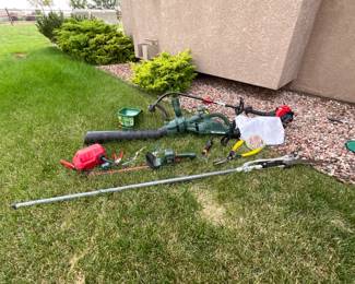 Troy Bilt 2 cycle trimmer. model TB22 EC. Black and Decker "Leaf Hog" leaf blower, includes collection bag. Black & Decker 22" blade hedge trimmers. Additional items as shown in photos.