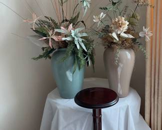 Two ceramic vases featuring pastel faux foliage. Each measures approximately H 35". Wood plant stand, H 26" x 12" diameter.