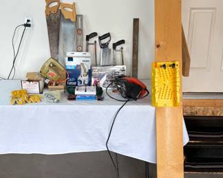 Black and Decker "Dragster" electric sander, model DS321. Powers on. New Allied 75 piece home repair tool set. New Bernzomatic manual torch plumbing kit. A variety of handsaws, and more. See photos for sampling.