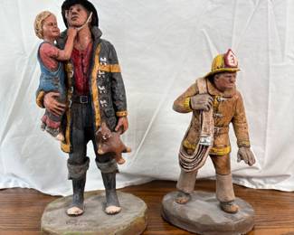 Michael Gorman Statues: 1986 'Firefighter', #2935-Black/Yellow, stamped, H 13 1/2", some small paint chips; 1995 'Advancing Line', #2005S-Tan/Yellow, stamped, H 10".