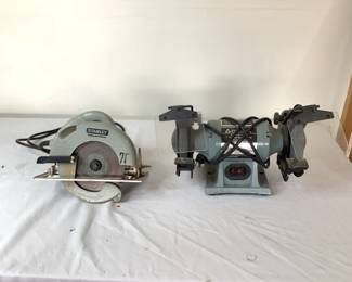 Stanley 7 1/4" super duty circular saw. Model .01. Delta 6" thin line bench grinder, model 23-660. Both items power on.