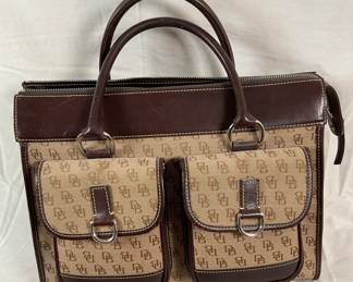 Dooney & Bourke brown logo handbag. Measures approximately H 10" x W 14" x D 6". Very good condition. Cannot authenticate.