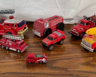 Eight (8) Tonka, Models of Yesteryear & more fire trucks. See photos for sampling.