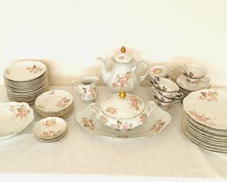Set of China made by Mitterteich in Germany. "Autumn Leaves" design. Includes a teapot with lid, a milk pitcher, (10) teacups, a covered casserole dish, a serving platter, (10) dinner plates, a serving bowl, (8) salad plates, (8) soup bowls, (11) saucers, (8) bread plates and (5) dessert bowls. One teacup is chipped and a few dishes have staining. See photos for details.