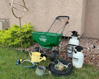 Scotts turf builder fertilizer spreader, (2) weed sprayers (some liquid inside) H 14" and H 18", a standing waterer H 48" and more. See photos for sampling.