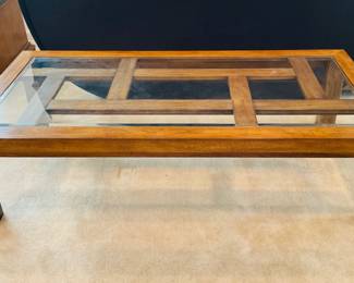 Appears to be a Drexel glass topped coffee table, H 16" x W 60" x D 30". Matches lots 214 and 217 in style.