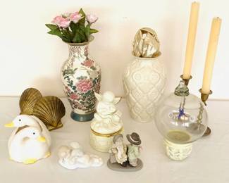 Two (2) brass shell bookends, H 4", several ceramic figurines, (2) vases, H 11", (2) candlesticks & more. See photos for sampling.