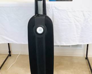 Riccar Supralite upright vacuum. Powers on. Includes box of HEPA media vacuum bags. Model R10S.2.