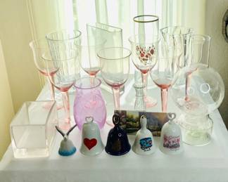 Seven (7) pink hand blown glass goblets, H 9 1/2" x 4" diameter. An eccentric collection of vases ranging in size from H 6" to H 9", a collection of bells and more. See photos for sampling.