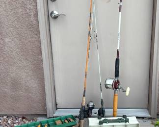 Four vintage fishing rods including a Zebco, Daiwa and Sam Scott Rod. Two tackle boxes, contents included.