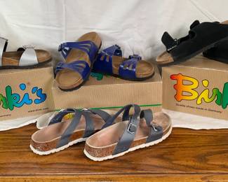 New Birki's black suede slip on shoes, size 38. New Birki's blue slip on leather shoes, size 38. New Papillio silver slip on shoes, size 38. Boxes do not match shoes inside. Birki's gray leather slip ons, size 38.