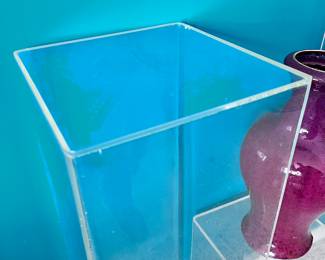Various Acrylic Display Stands mad for the art gallery. Short and tall ones