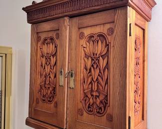 Carved hanging cabinet made by prisoner of war WWII