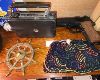 Vtg bb pistol, embroidered purse, ship’s wheel pen holder and Vtg. Movie camera 