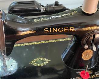 LOT 248 1950'S SINGER SEWING MACHINE WITH CABINET