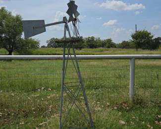 Vintage windmill yard art
