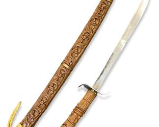 Detailed Carved Wood and Steel Sheathed Sword