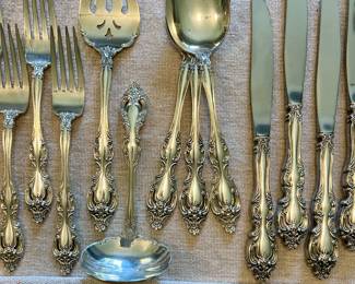 Tradition Sterling flatware set - 61pc. 
12 knives, 12 lg.  forks, 9  sm. forks,  23 spoons & 5 serving pieces