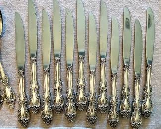 Tradition Sterling flatware set - 61pc. 
12 knives, 12 lg.  forks, 9  sm. forks,  23 spoons & 5 serving pieces