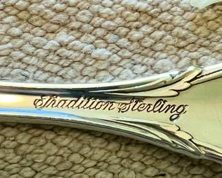 Tradition Sterling flatware set - 61pc. 
12 knives, 12 lg.  forks, 9  sm. forks,  23 spoons & 5 serving pieces