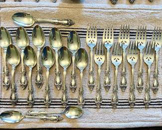 Tradition Sterling flatware set - 61pc. 
12 knives, 12 lg.  forks, 9  sm. forks,  23 spoons & 5 serving pieces