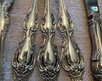 Tradition Sterling flatware set - 61pc. 
12 knives, 12 lg.  forks, 9  sm. forks,  23 spoons & 5 serving pieces