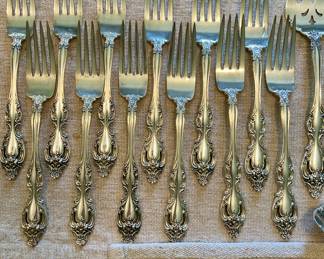 Tradition Sterling flatware set - 61pc. 
12 knives, 12 lg.  forks, 9  sm. forks,  23 spoons & 5 serving pieces