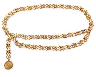 1150
CHANEL: A Vintage CC Gold Metal Chain Link Belt
A long gold-toned metal belt featuring double figure-eight interlocked "infinity" links, with double swag chain to front and raised work CC medallion, marked to hook for Chanel, circa 1970s
Belt: 40 in.; medallion: 1 1/2 in. Dia.
291.0 grams gross
Estimate: $600 - $800
