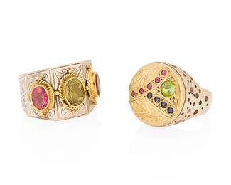 1094
Two 18K Gold, Silver and Gem-Set Rings
Featuring peridot, pink tourmaline, rubies and sapphires set in ornate designs, both rings marked "K"
2 pieces
Sizes: 6 1/2
28.2 grams gross
Estimate: $800 - $1,200