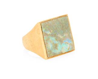 1016
A 14K Gold and Opal Ring
Featuring a square-shaped opal tablet measuring approximately 21.49 x 22.06 x 3.67 mm
Size: 11
29.4 grams gross
Estimate: $1,200 - $1,800