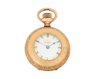 1131
Elgin: A Gold Pocket Watch
Dial: white with Roman Numerals
Model:6755372
Case number: 5073375
Closure: featuring a gold-filled watch chain suspending a 10k gold locket fob
Size: 12s
55.0 grams gross
Estimate: $800 - $1,200