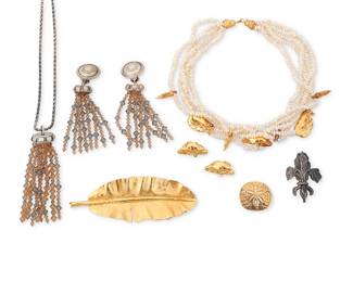 1168
Mignon Faget: A Group of Sterling Silver and Vermeil Jewelry
Comprising a multi-strand freshwater pearl choker necklace with vermeil sterling charms in lobster and crab motifs, with a pair of matching earrings, together with a 1992 sterling silver and crystal bead sautoir tassel necklace with a pair of matching earrings, as well as a 14K gold sand dollar pendant, a Fleur-de-lis sterling brooch, and a leaf motif vermeil metal belt buckle
9 pieces
Necklaces: 36 3/8 in. & 16 in.; Earrings: 4 in. & 1 in.; Pendant: 1 1/8 in x 1 3/4 in.; Brooch: 2 in x 1 3/4 in.; Buckle: 1 3/4 in. x 5 in.
264.6 grams gross
Estimate: $1,000 - $2,000