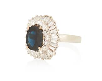 1054
A 14K White Gold, Sapphire and Diamond Ring
Centering a rectangular cushion-cut sapphire weighing approximately 4.25 carats accented by round and tapered baguette diamonds weighing approximately 2.30 carats
Size: 8 1/4
9.8 grams gross
Estimate: $600 - $800
