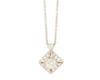 1081
A Platinum and Diamond Necklace
Featuring a round diamond weighing approximately 0.50 carat accented by round diamonds weighing approximately 0.30 carat
Length: 20 in.
7.3 grams gross
Estimate: $800 - $1,200