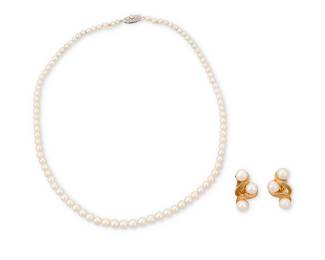 1036
A Group of Gold and Cultured Pearl Jewelry
Including a pair of 14k gold and cultured pearl scrolling earrings, together with a graduated single strand of cultured pearl, pearls measuring approximately 3.50-7.00 mm
3 pieces
Earrings: 1 x 1/2 in., Necklace 15 in.
20.5 grams gross
Estimate: $300 - $500