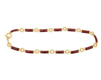 1147
Gucci: A Vintage Gold Metal and Enamel Link Belt
A gold-toned metal chunky link belt with dark red enamel rectangular links, marked to toggle for Italy and Gucci
Measures: 36 3/4 in. x 1 in.
194.0 grams gross
Estimate: $200 - $400