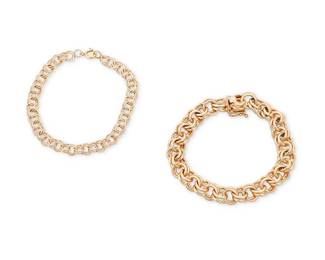 1106
Two 14K Gold Bracelets
Both of a fancy link design
2 pieces
Lengths: 7 1/4 in. and 7 1/2 in.
42.0 grams gross
Estimate: $1,500 - $2,500
