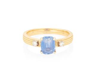 1051
An 18K Gold and Sapphire Ring
Centering a rectangular cushion-cut sapphire weighing approximately 1.25 carats accented by two round diamonds
Size: 6 1/2
3.6 grams gross
Estimate: $500 - $700