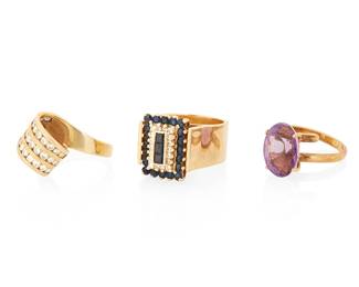 1020
A Group of 14K Gold and Gem-Set Rings
Including three rings set with round diamonds, sapphires and an oval amethyst
3 pieces
Size: 6 1/4 and 7
24.9 grams gross
Estimate: $1,200 - $2,200