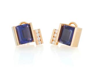 1015
A Pair of Gold, Iolite and Diamond Earrings
Featuring two emerald-cut iolites weighing approximately 8.00 carats total, accented by eight round diamonds, set in an angular mount
2 pieces
Measures: 1/2 x 5/8 in.
13.7 grams gross
Estimate: $800 - $1,200