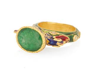 1097
A Mughal Style 14K Gold and Enamel Ring
Featuring a double bird head design accented by red, blue and green enamel centering an oval foil backed beryl measuring approximately 13.9 x 10.8 mm
Size: 8 3/4
12.0 grams gross
Estimate: $600 - $800