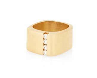 1007
A 14K Gold and Diamond Ring
Of a high polish square design accented by a line of four round diamonds weighing approximately 0.40 carat, signed JB
Size: 9
20.3 grams gross
Estimate: $800 - $1,200
