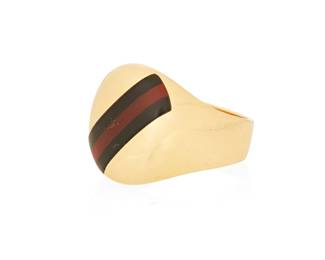 1002
Fred of Paris: An 18K Gold and Hardstone ring
Featuring a carnelian and onyx stripe inlay, signed Fred Paris, W Germany
Size: 9 1/2
12.3 grams gross
Estimate: $800 - $1,200