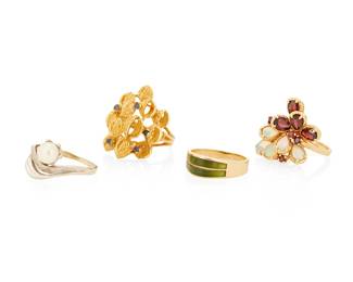 1021
A Group of Gold and Gem-Set Rings
Including an 18k gold and jade ring, an 18k gold and sapphire organic style ring, a 14k gold, opal and garnet ring and a 10k white gold and cultured pearl ring
4 pieces
Sizes: 8, 8 1/4 and 8 1/2
24.5 grams gross
Estimate: $1,000 - $2,000