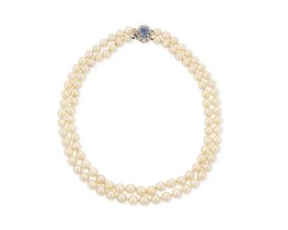 1025
A 14K White Gold, Cultured Pearl and Sapphire Necklace
Of a nested double strand design featuring cultured pearls measuring approximately 7.10 -7.65 mm, finished with a white gold and diamond set clasp centering an oval sapphire weighing approximately 1.82 carats
Length: 15 1/2 in.
62.1 grams gross
Estimate: $1,000 - $2,000