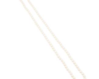 1033
A 14K Gold, Cultured Pearl and Diamond Necklace
Of a single strand design featuring cultured pearls measuring approximately 8.15 mm, finished with a gold mabe pearl and round diamond clasp
Length: 36 in.
83.3 grams gross
Estimate: $300 - $500