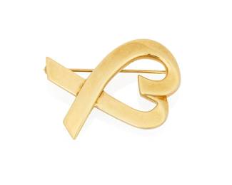 1011
Paloma Picasso for Tiffany & Co: An 18K Gold "Loving Heart" Brooch
Of ribbon heart design, signed Paloma Picasso and Tiffany & Co.
Measures: 1 3/8 x 1 in.
12.6 grams gross
Estimate: $600 - $800